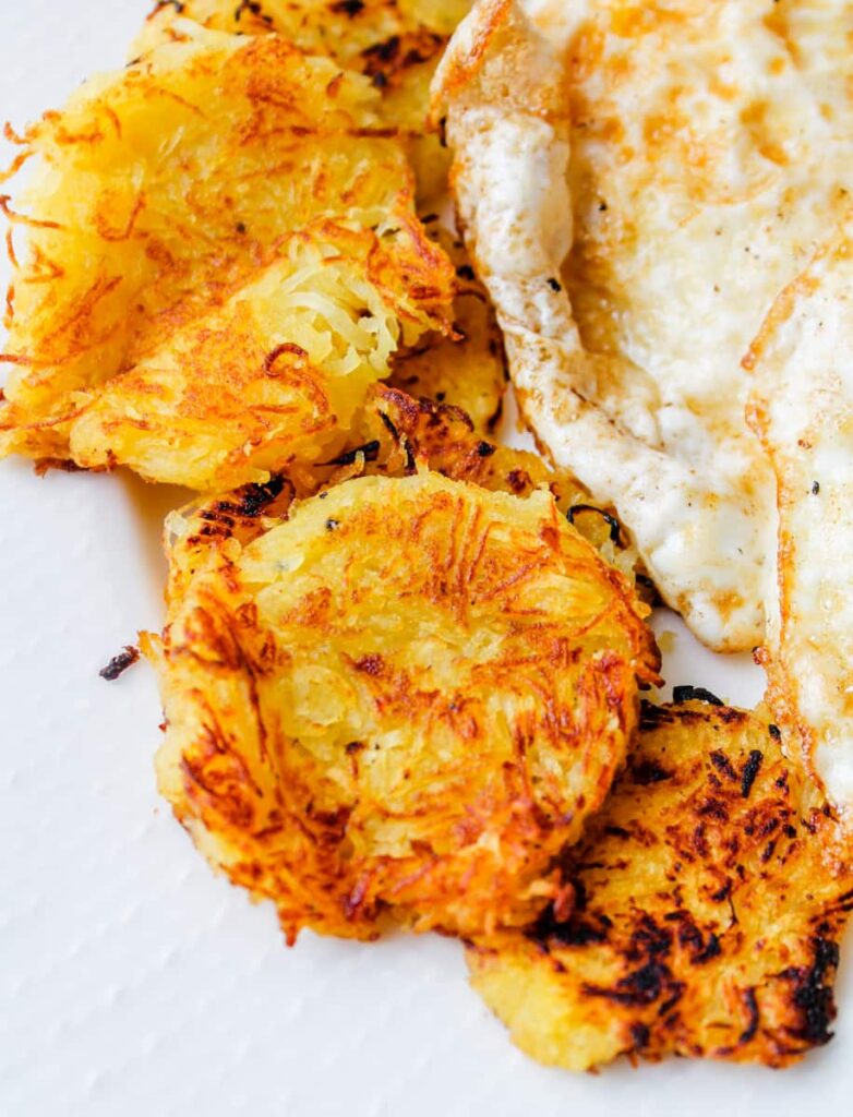 One of my few carb weaknesses are hash browns.  I love hash browns.  These are delectable and easy to make and they hit all the right notes in shape and texture.  Let's face it potatoes take on the taste of whatever you prepare them with and so do these. 